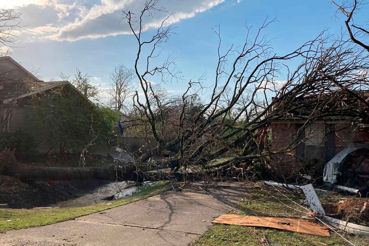 A tornado raced through Little Rock and surrounding areas Friday, splintering homes, overturning vehicles and tossing trees and debris on roadways as people raced for shelter .(AP Photo/Andrew DeMillo)